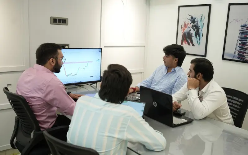 Indian student attending live online stock market class via Zoom